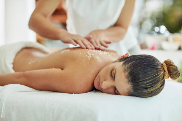 Shot of an attractive young woman getting an exfoliating treatment at the spa